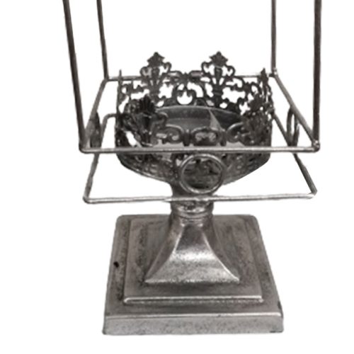 Candelabro de metal plateado