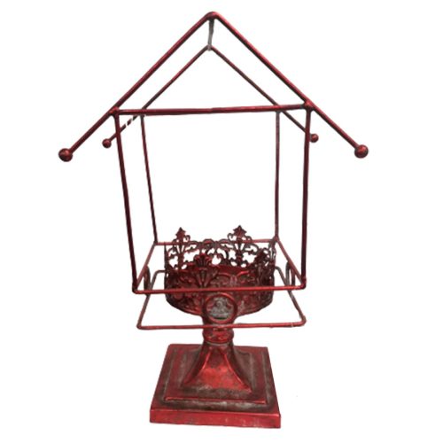 Candelabro de metal rojo