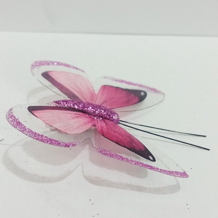 Mariposa rosa con pinza - Image 3