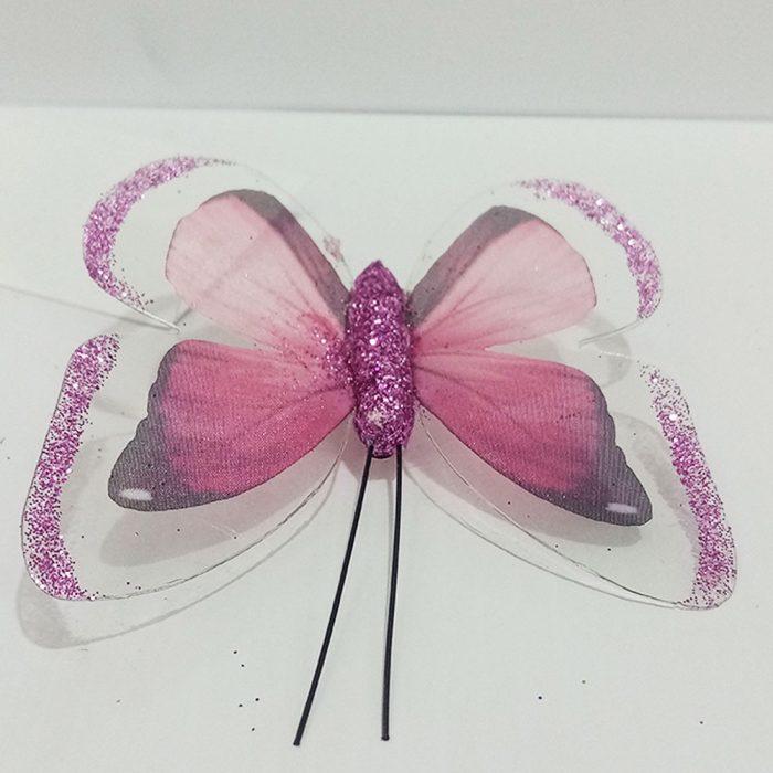Mariposa rosa con pinza - Image 4