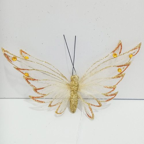 Mariposa dorada con pinza
