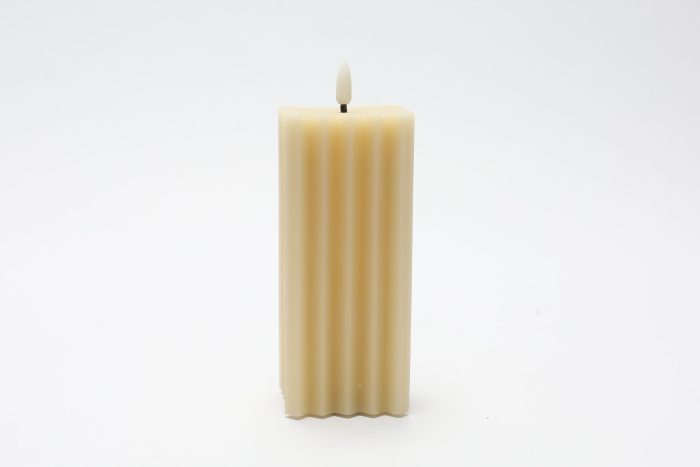Vela de cera beige - Galerías el Triunfo - 180207889070