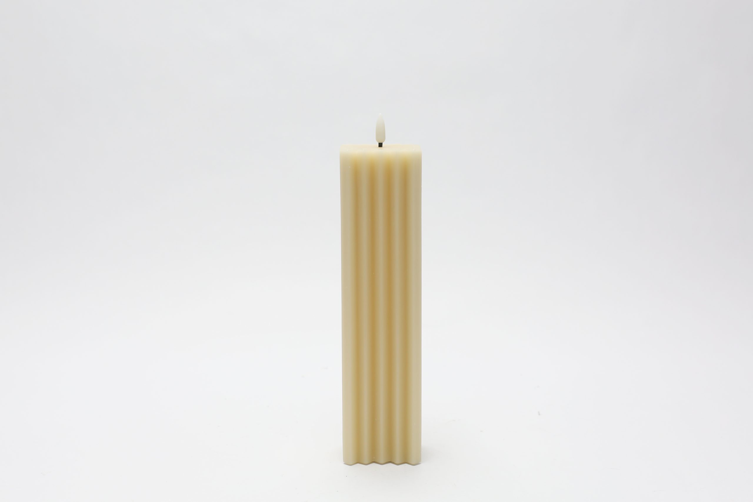 Vela de cera beige - Galerías el Triunfo - 180207889071