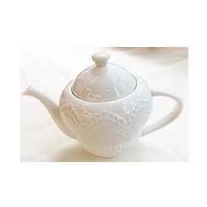 Tetera de cerámica blanca