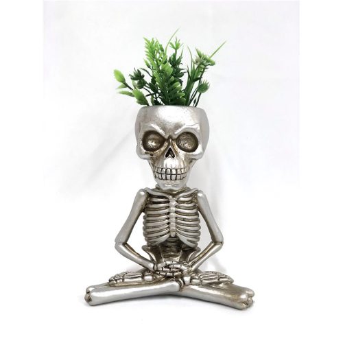 Maceta calavera haciendo yoga