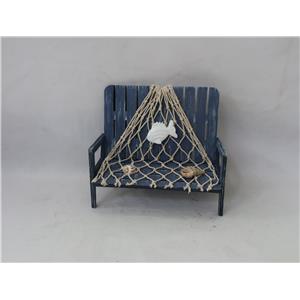 Banca de madera con red de pesca