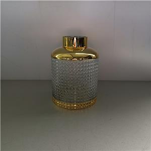 Florero de vidrio dorado con transparente de 16x16x22cm