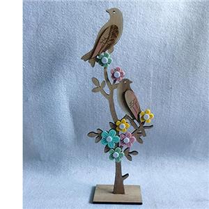 Árbol de madera en soporte con pájaros