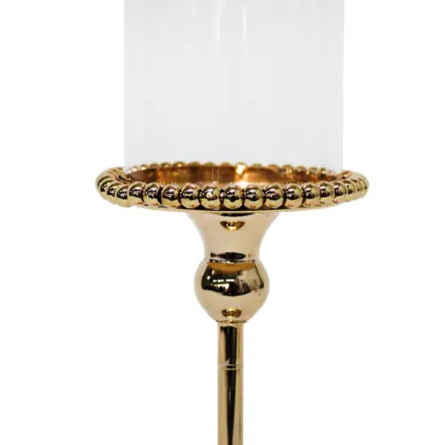 Candelabro de metal dorado con cilindro de vidrio de 12x12x33.5cm