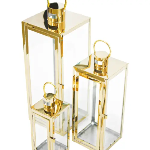 Juego de 3 candelabros de metal dorados de 18x18x49cm