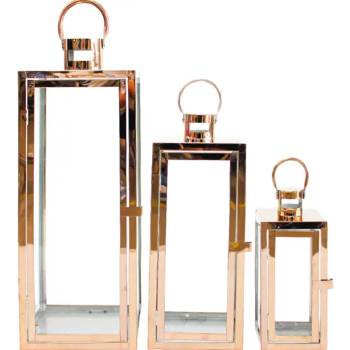Juego de 3 candelabros de metal de color marron de 18x18x49cm