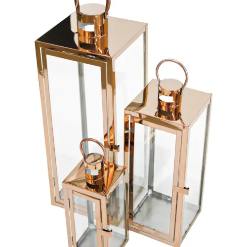Juego de 3 candelabros de metal de color marron de 18x18x49cm