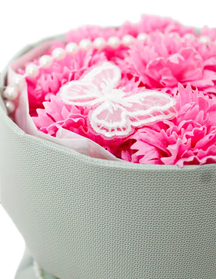 Bouquet de flores rosa en display - Image 4