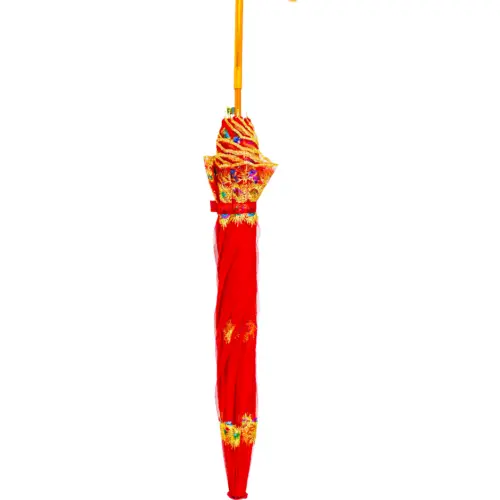 Paraguas rojo con dorado
