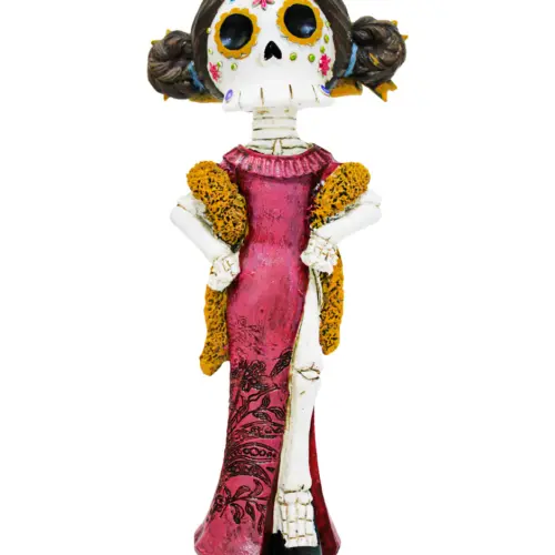 Esqueleto de poliresina de mujer con vestido rosa de 12x7x26.5cm