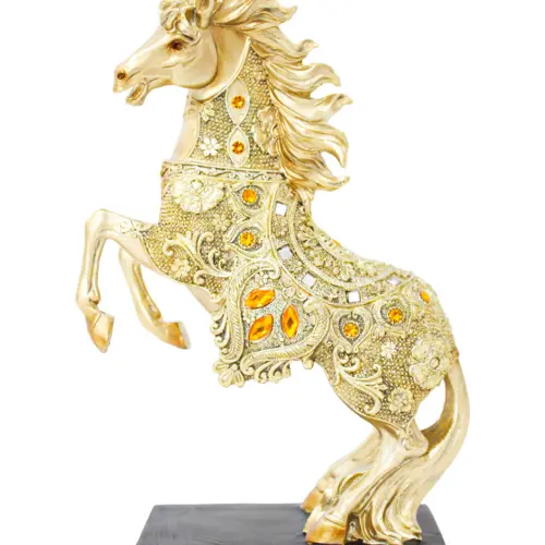 Caballo de poliresina dorado con incrustaciones ámbar de 19x8x30cm