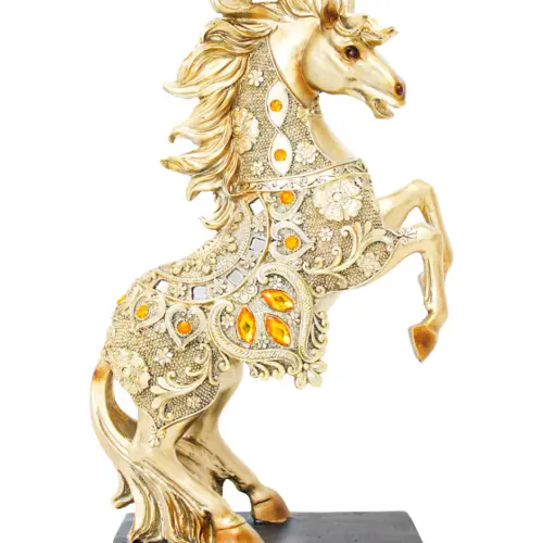 Caballo de poliresina dorado con incrustaciones ámbar de 21x9x34.5cm