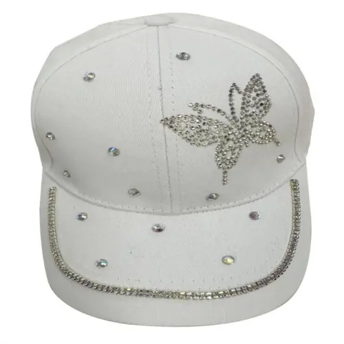 Gorra blanca con diseño mariposa y pedreria de 15x28x11cm