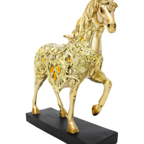 Caballo de poliresina dorado con detalles ámbar de 22x6x23.5cm
