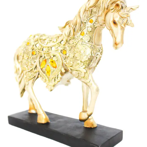 Caballo de poliresina dorado con plateado con incrustaciones de color ámbar de 32x8x27.5cm