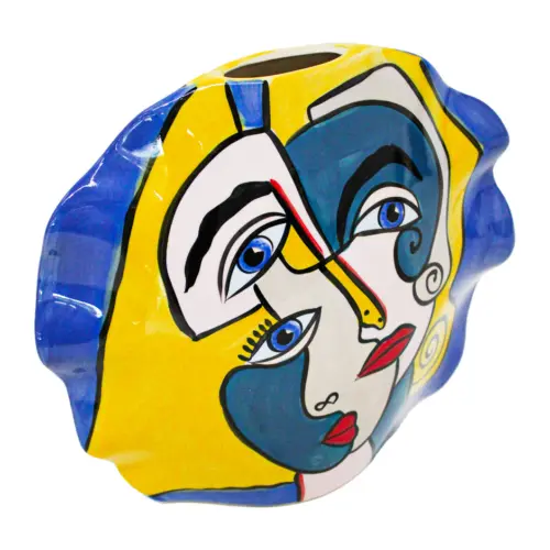 Florero de porcelana ondulado con rostros de muejeres de 32.5×11.8x28cm