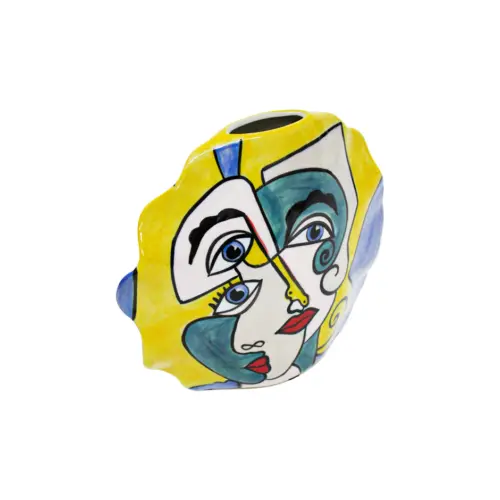 Florero de porcelana ondulado con rostros de mujeres de 22.5×7.7x20cm