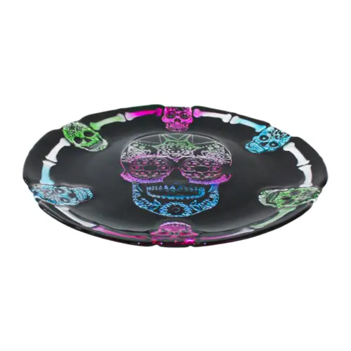 Plato de cristal negro con calaveras iridiscentes y orilla diseño huesos de 32cm
