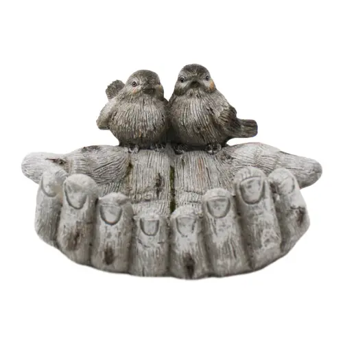 Pajaritos en mano de poliresina de  34.5×30.5x19cm