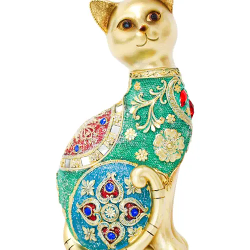 Gato de poliresina dorado con incrustaciones rojas y azules de 15x10x30cm