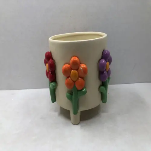 Maceta de ceramica beige con flores de colores de 19.6×17.7cm