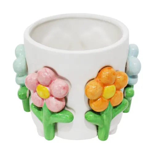 Maceta de ceramica blanca con flores de colores de 17.xx14.5cm