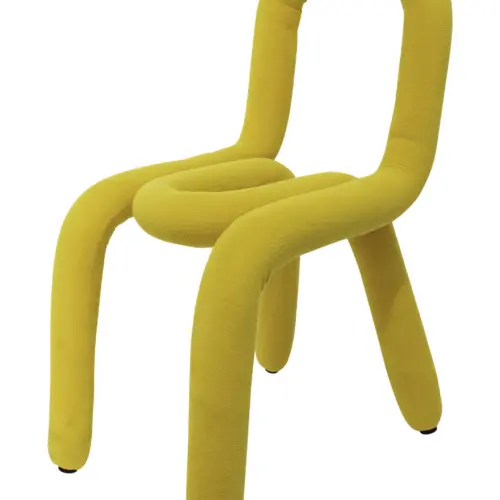 Silla de terciopelo amarillo con respaldo descubierto de 37x53x79cm