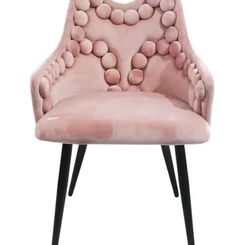 Silla de terciopelo con descansabrazos y diseño en el respaldo rosa de 54x61x86cm
