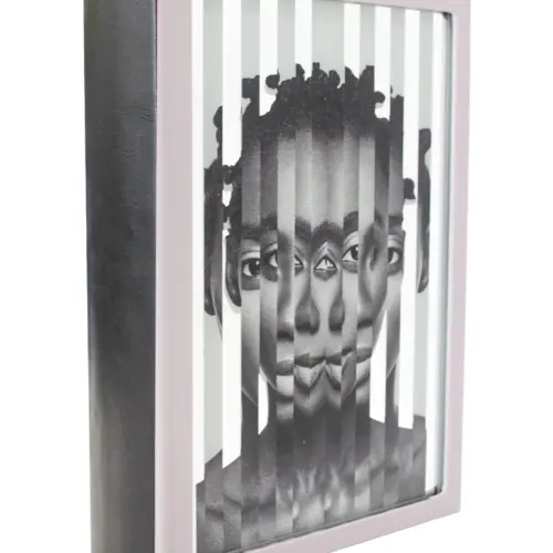 Caja de libro con espejo diseño rostro abstracto de 30x21x7cm