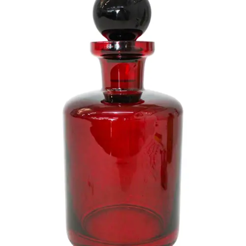 Botella de vidrio rojo con tapa de 12x28cm