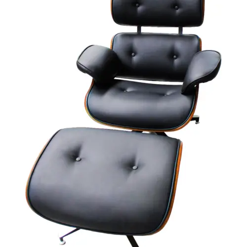 Sillón de polipiel negro con ottoman de 78x76x86/65x55x22cm