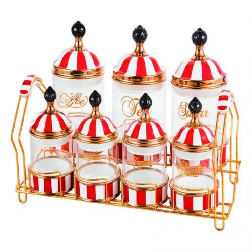 Juego de 7 especieros de porcelana con vidrio y tapa rojo con blanco y base de metal de 11x11x16cm