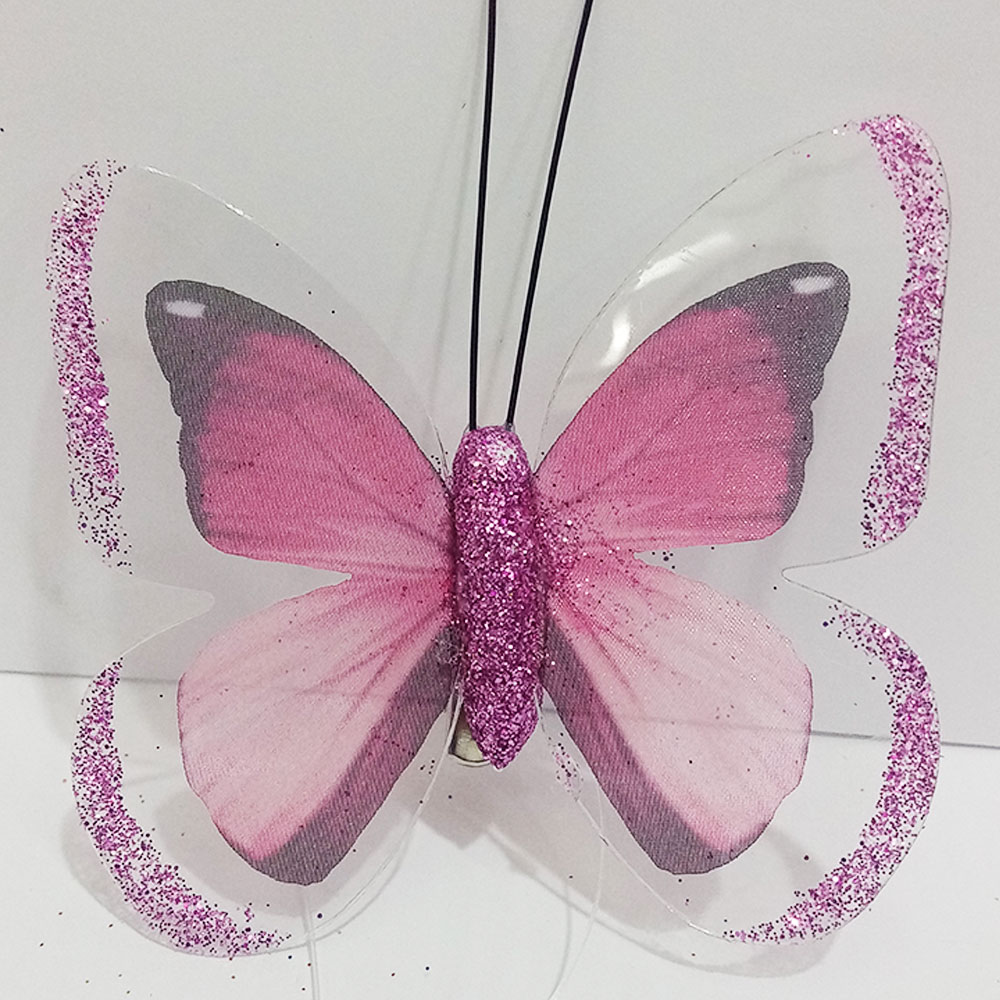 Mariposa rosa con pinza - Galerías el Triunfo - 100307378292