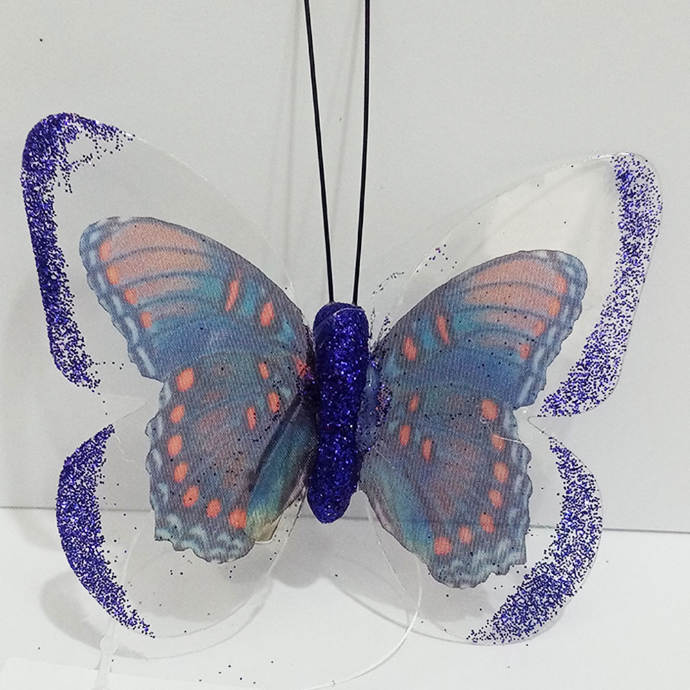 Mariposa purpura con pinza - Galerías el Triunfo - 100307378293