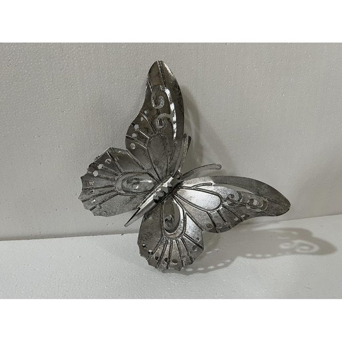 Mariposa de metal - Galerías el Triunfo - 074072300582