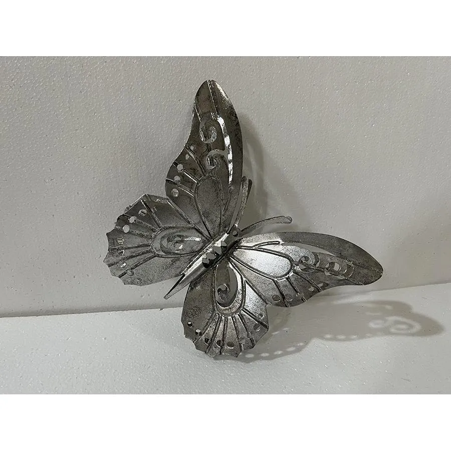 Mariposa de metal - Galerías el Triunfo - 074072300582