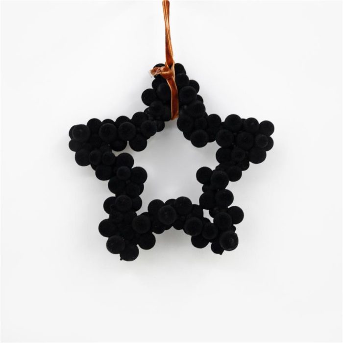 Estrella con pompones negros - Galerías el Triunfo - 100307378468