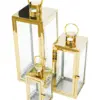Juego de 3 candelabros de metal dorados de 18x18x46cm - Image 2