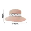 Sombrero tejido rosa con listón blanco y puntos negros de30x30x15cm - Image 4