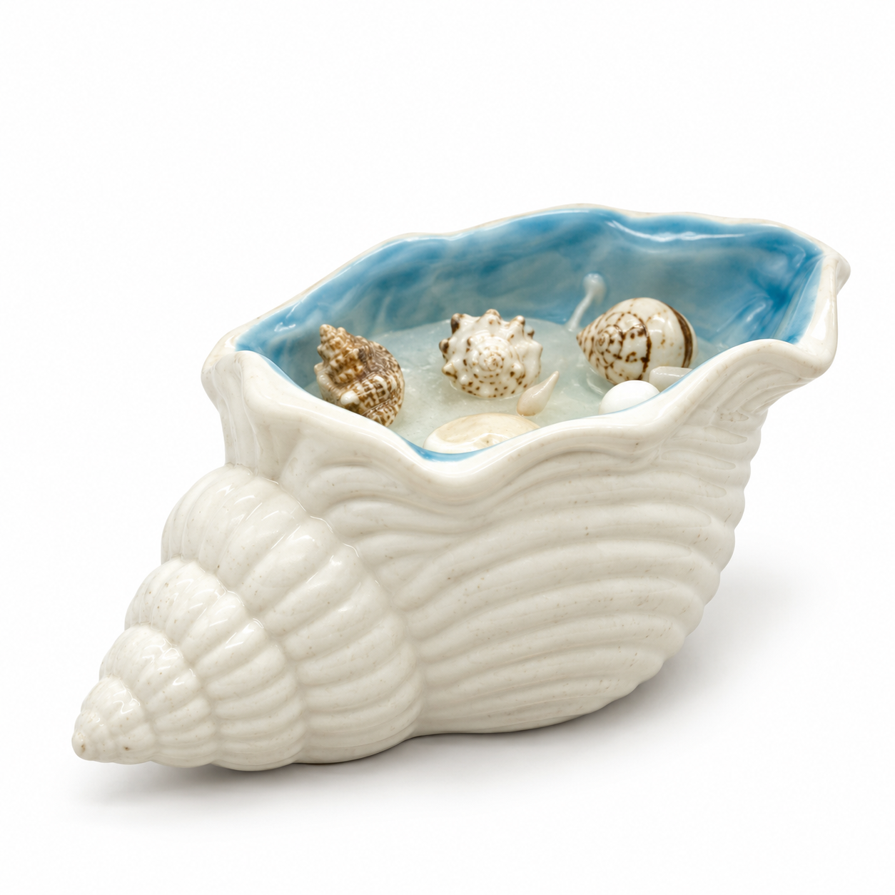 Vela en Caracola con Conchas y Piedras Marinas – Galerías el Triunfo
